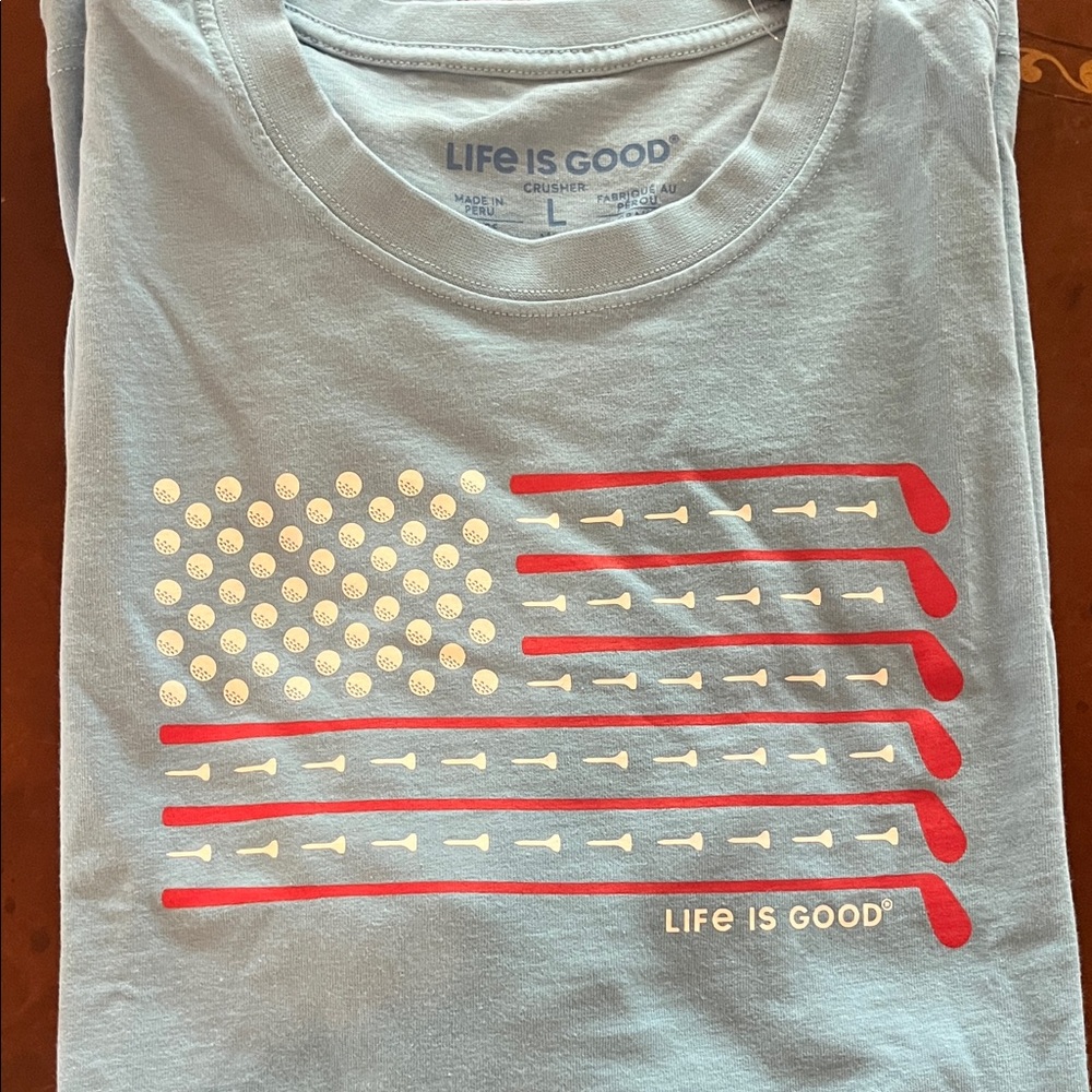 Life Is Good Light Blue Men’s' Golf Flag Tee with Red & Cream Graphic